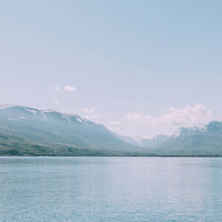 Lake with snowy mountains